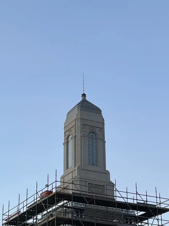 The temple tower under scaffolding during construction