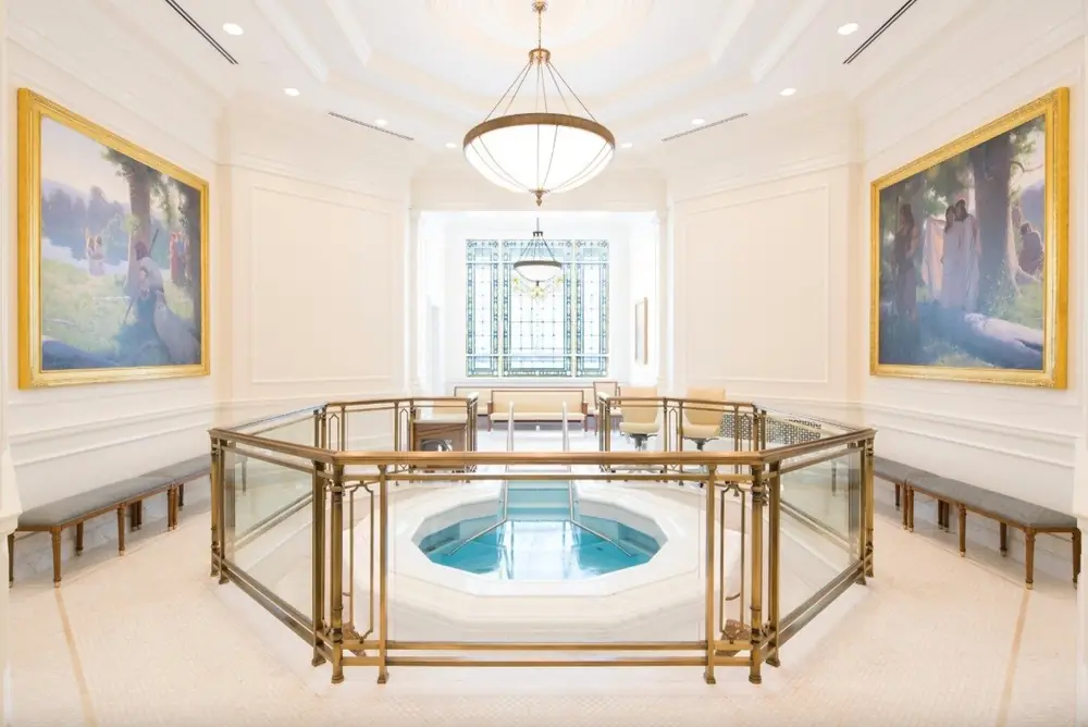 Completed bronze baptistry guardrail with glass infill panels surrounding the font at the Raleigh North Carolina Temple