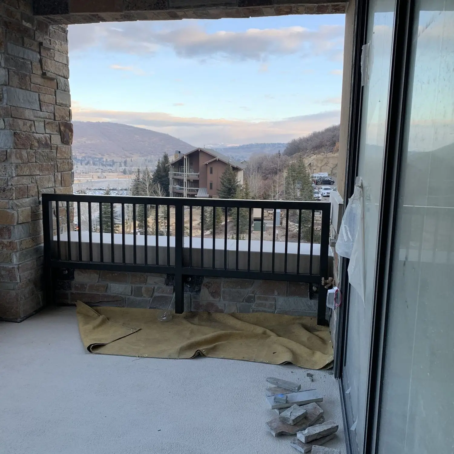 Installed balcony guardrail at The Residences at St. Regis looking out over the Park City mountains
