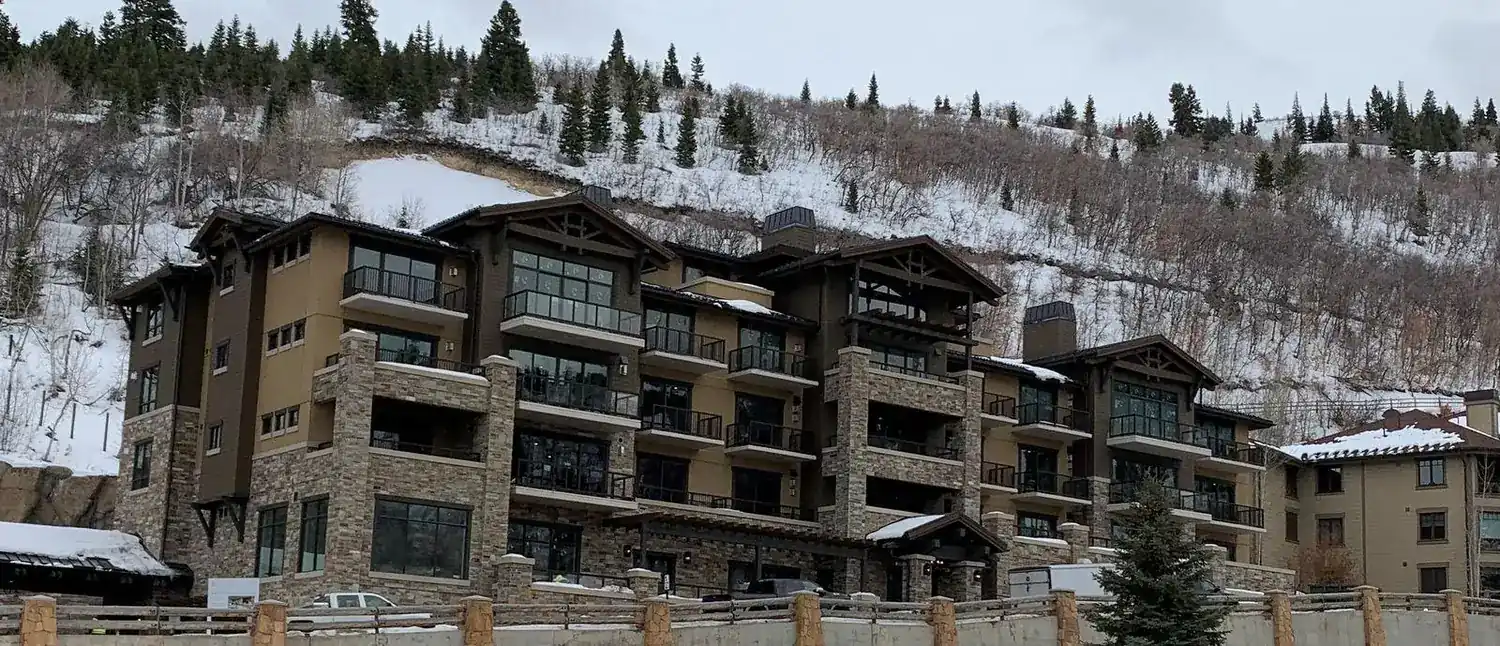 The Residences at St. Regis on the Park City hillside during winter construction
