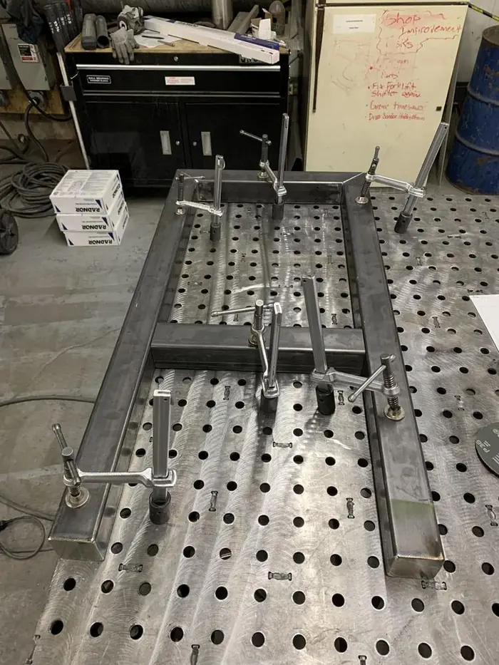 Rail assembly being fabricated on a fixture table in the Arnold Quality shop